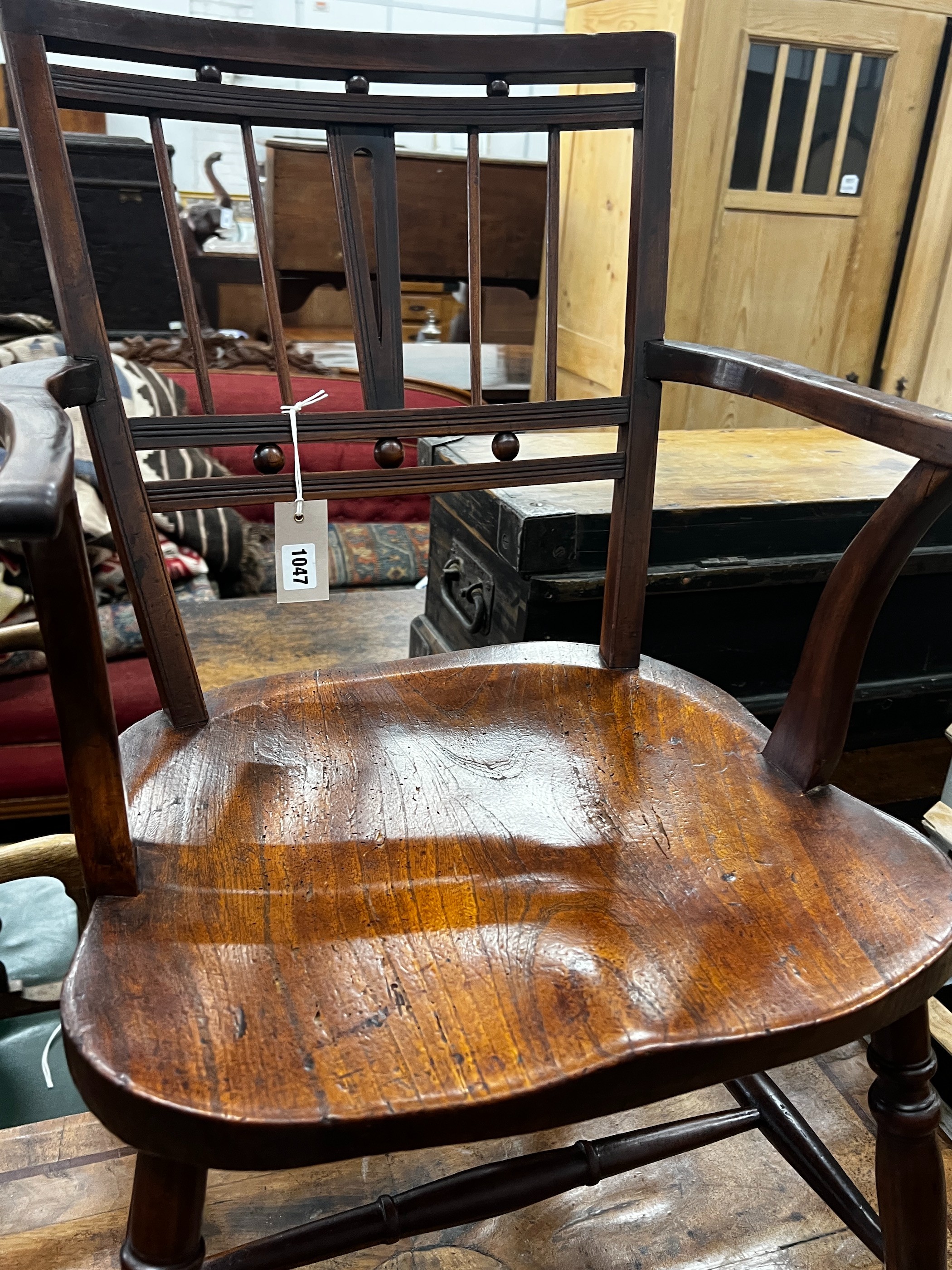 A mid 19th century elm and fruitwood Mendlesham elbow chair by Richard Day, width 48cm, depth 40cm, height 84cm